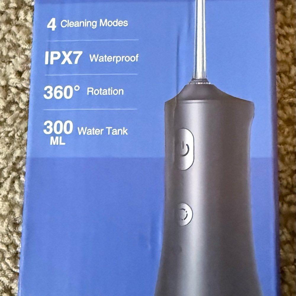 Operan Cordless Oral Irrigator (water flosser).